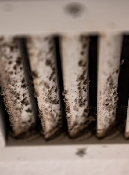 White vent showing dirt and grime from daily use.