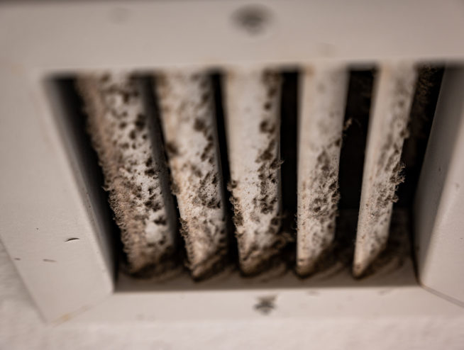 White vent showing dirt and grime from daily use.